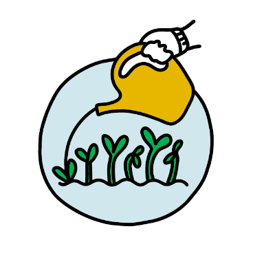 A hand watering small plants