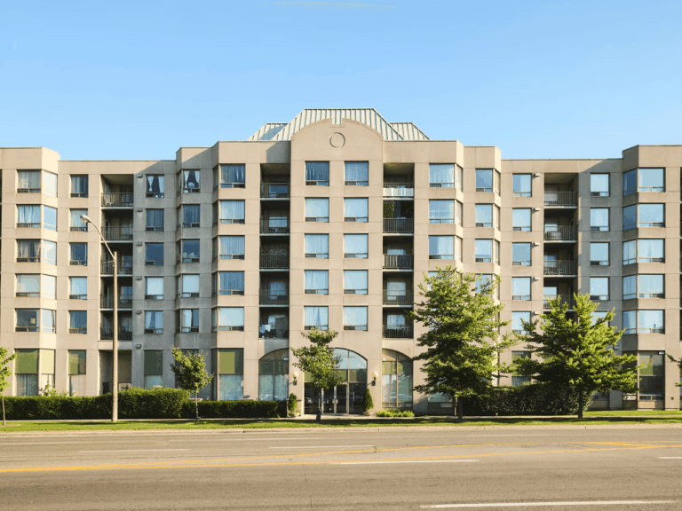 Exterior shot of an affordable housing apartment complex by Kehilla Affordable Housing